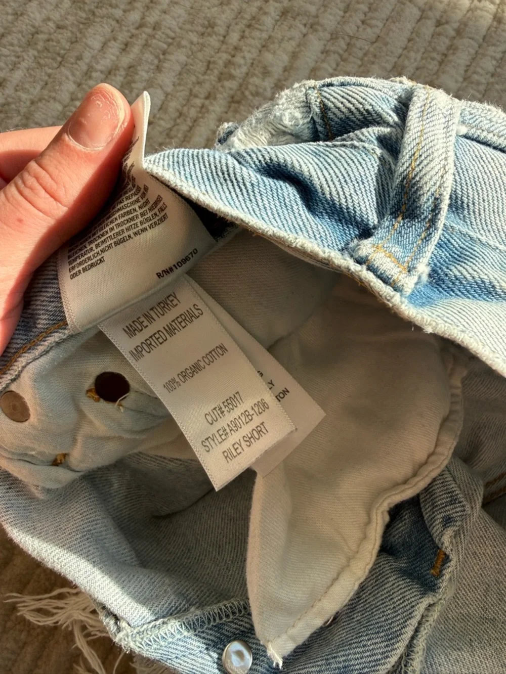 Agolde Riley Distressed High-Rise Light Blue Denim Shorts - Picture 2 of 5